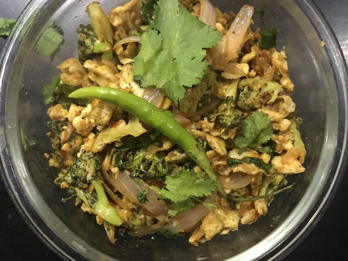 Broccoli and egg bhurji in a glass bowl
