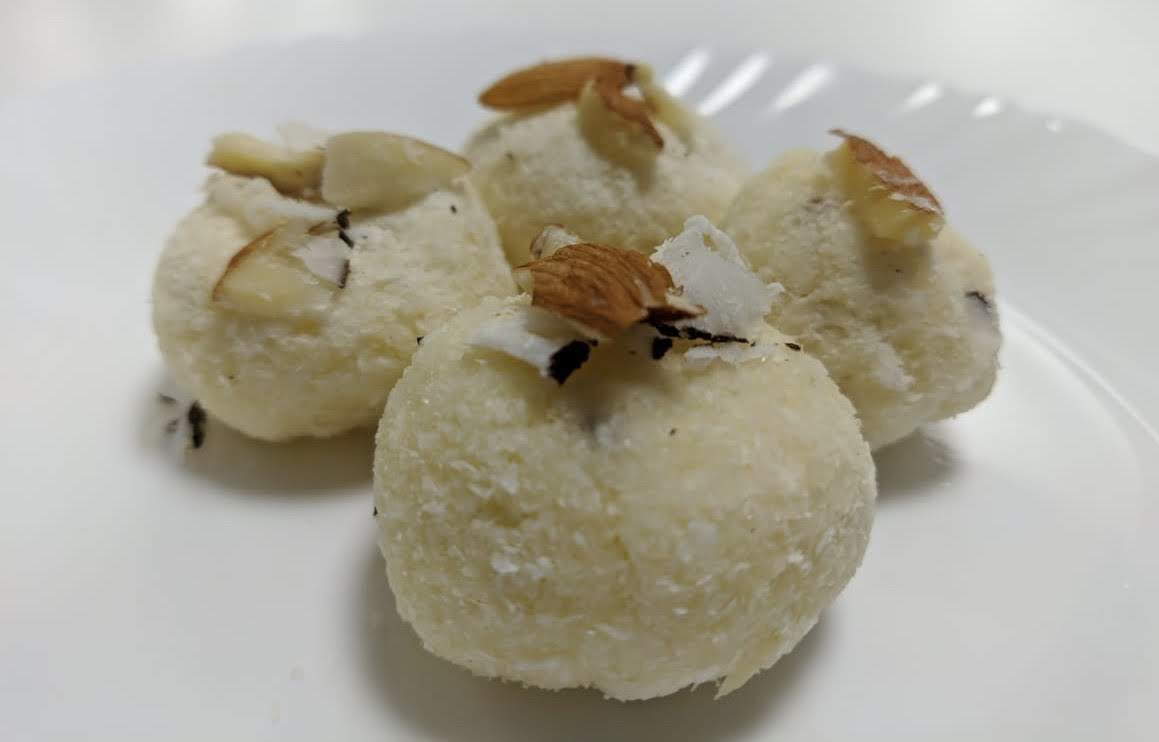 Coconut and almond flour ladoo with almond slivers