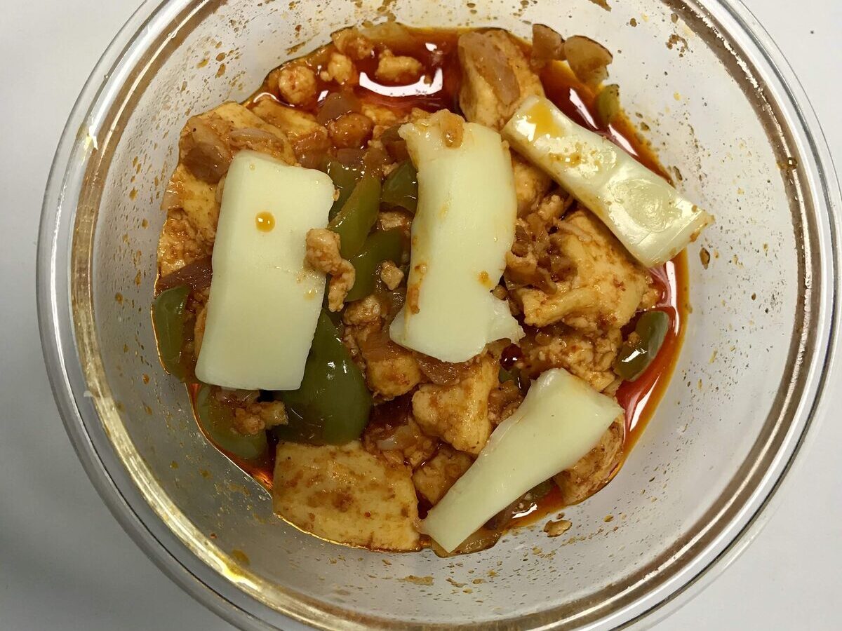 Ghee-sauteed vegetables with paneer and melted cheese