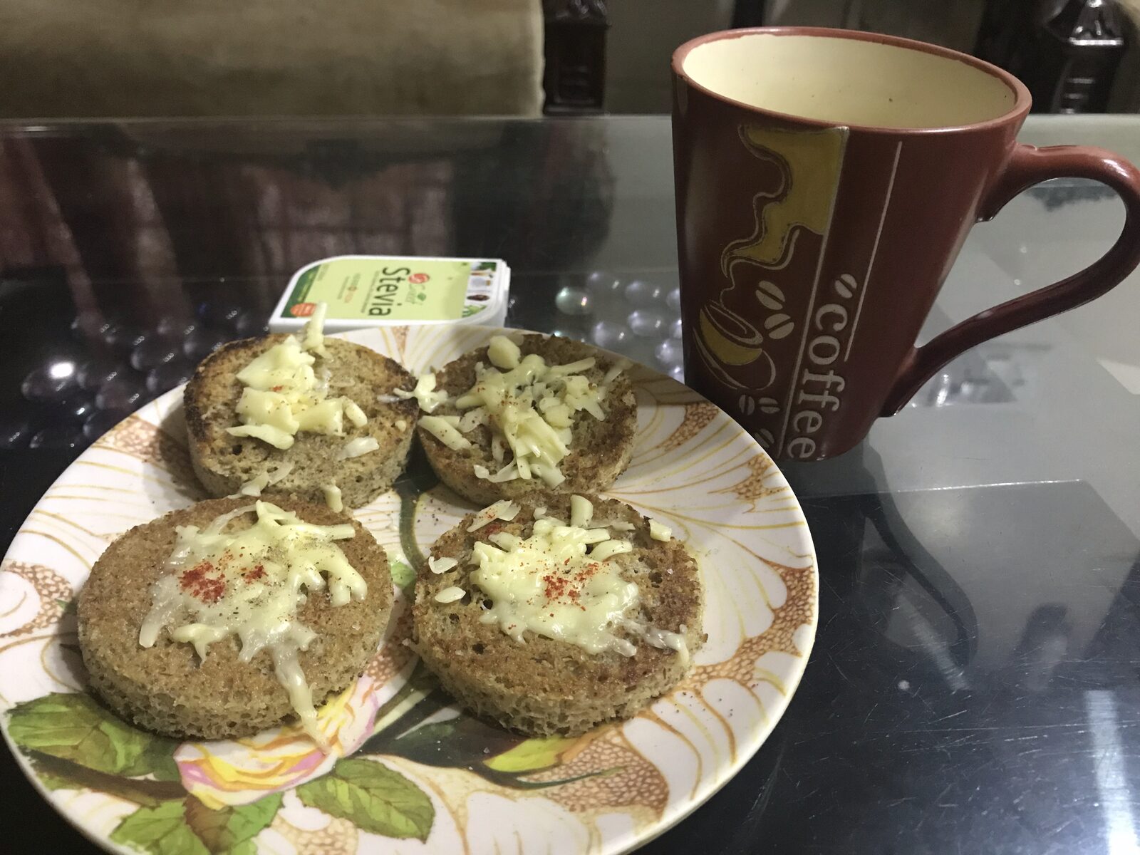 Keto mug bread rounds topped with melted cheese