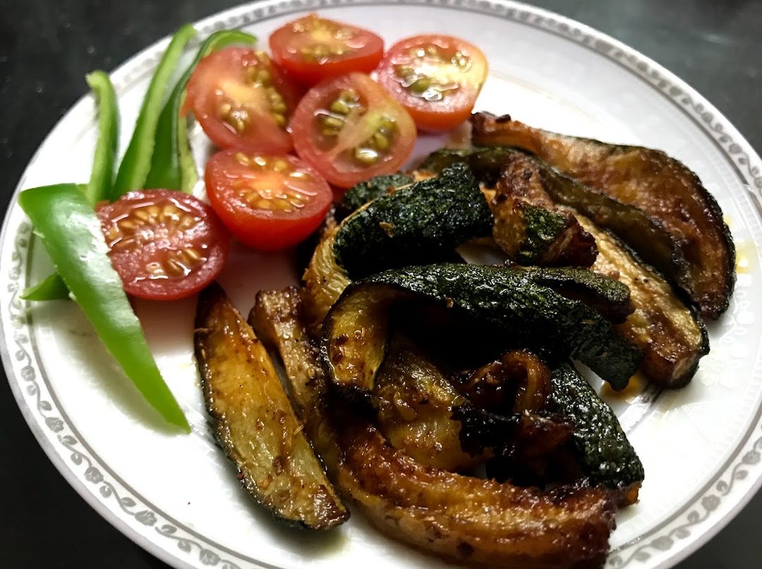 Grilled zucchini with tomatoes