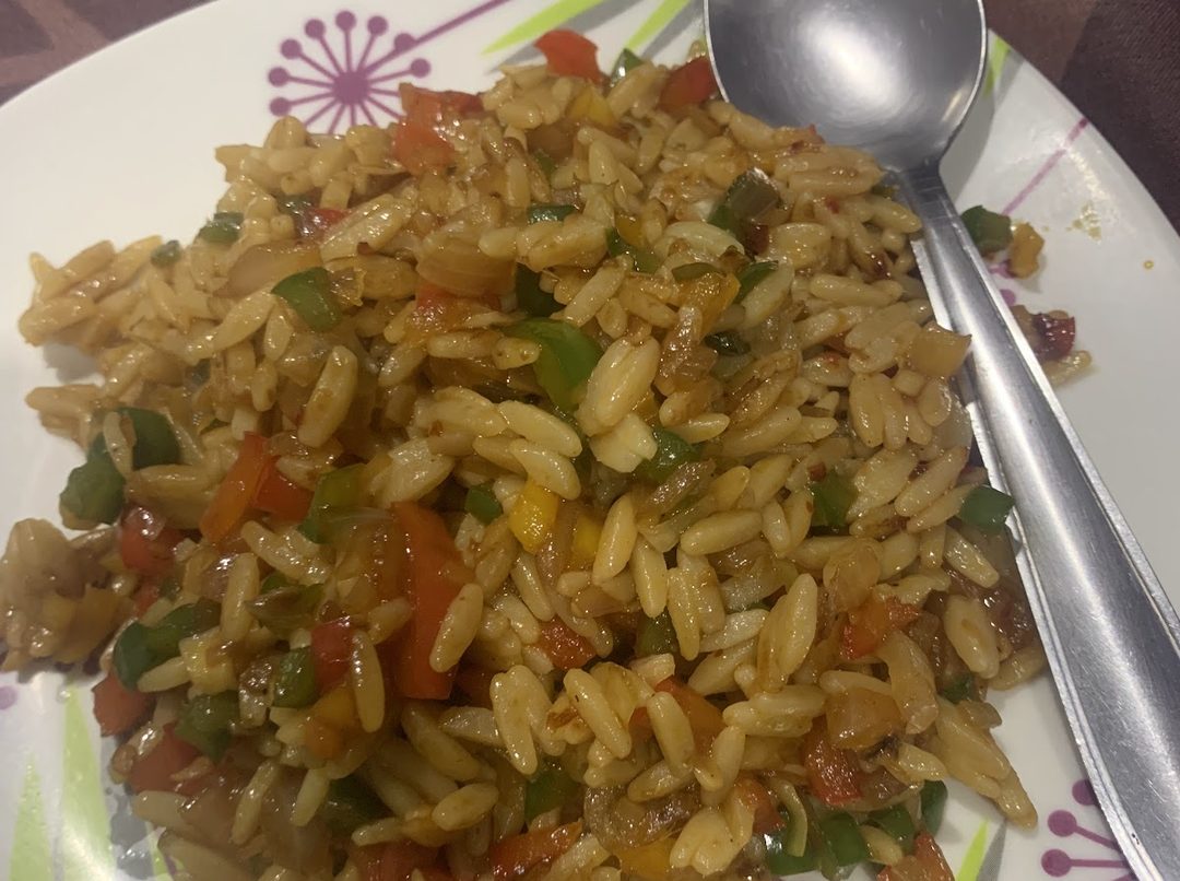 Low carb keto rice stir-fried with finely chopped mixed vegetables